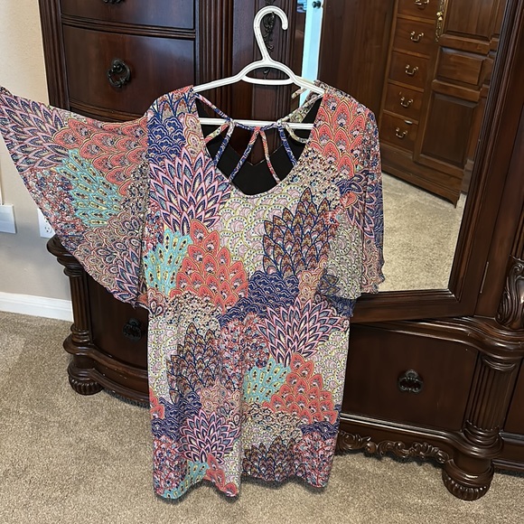 This is a soft boho midi dress with flutter sleeves.  Back has straps. - Picture 2 of 6